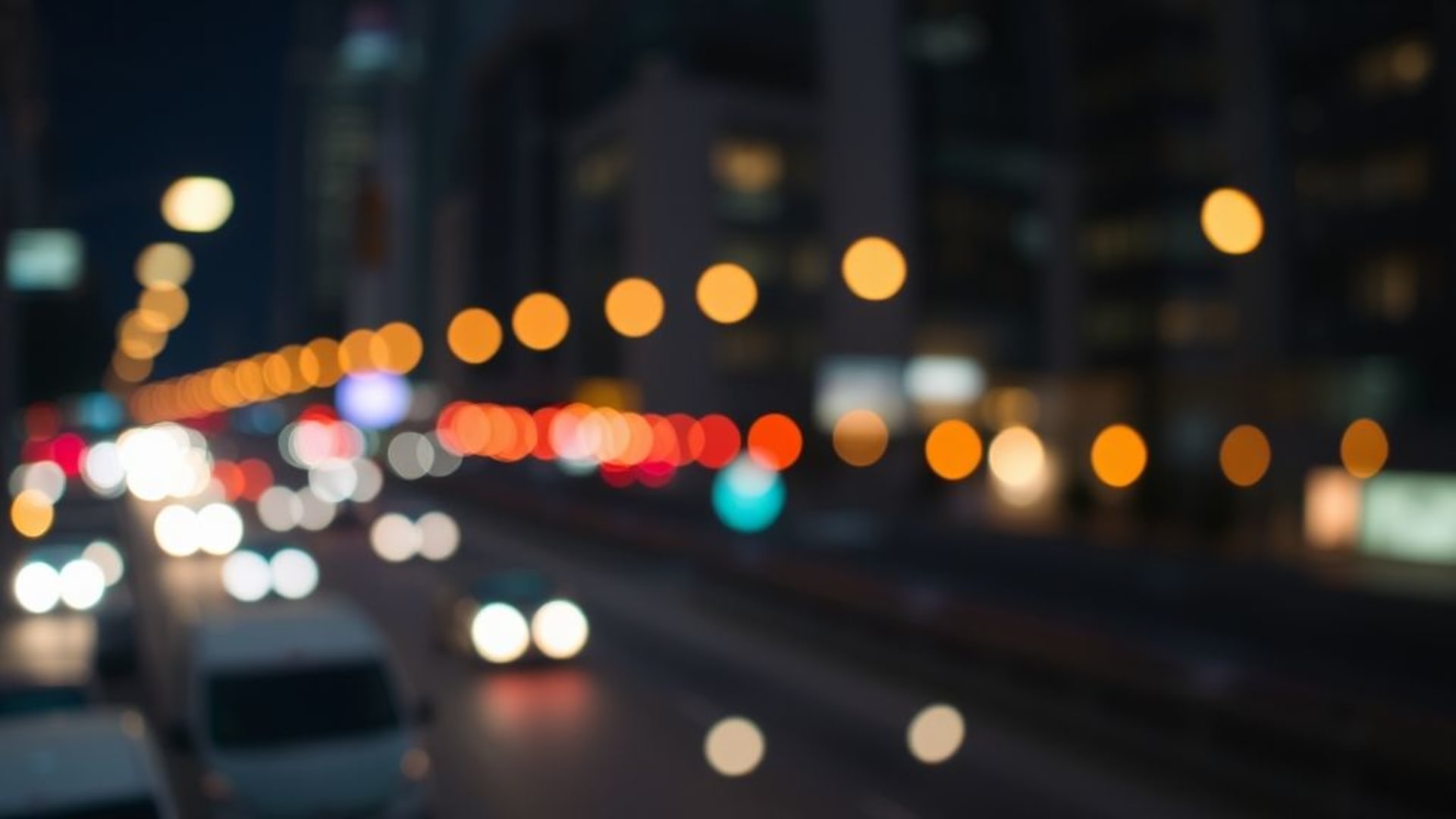lumières bokeh douces nuit urbaine fond d'écran bureau lueur subtile particules