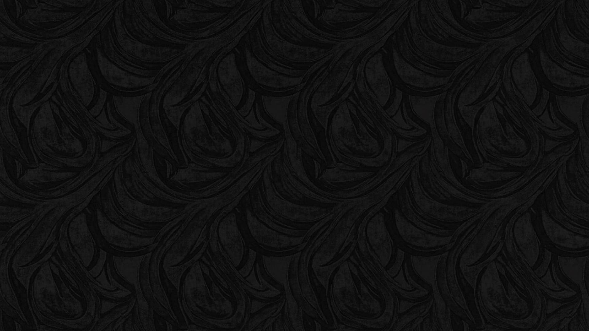 fond ecran en velours noir abstrait et sombre, texture velours, brillance subtile, luxe riche et tactile