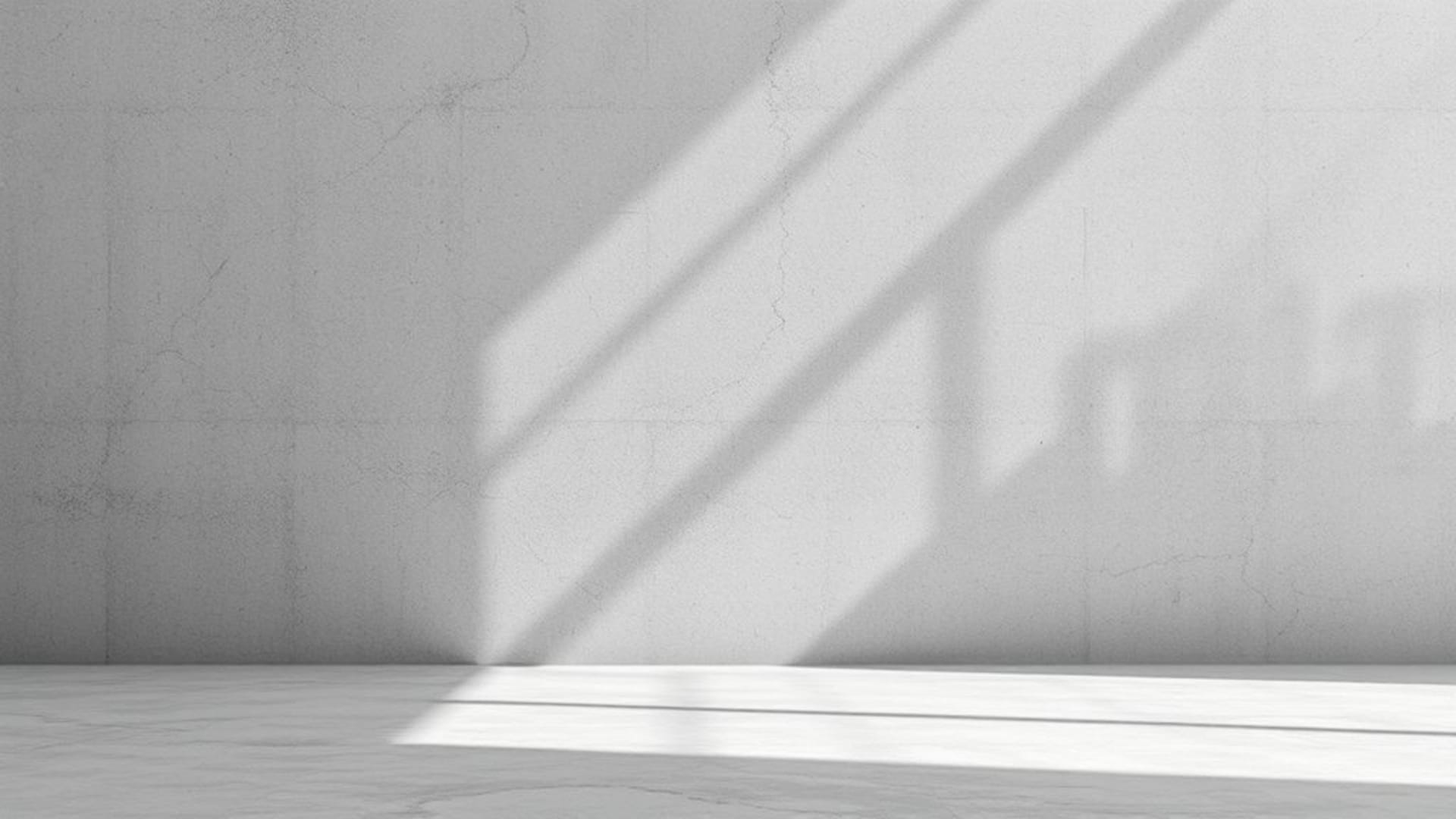 textures monochromes minimalistes en papier, béton, tissu, ombres subtiles, mise au point douce