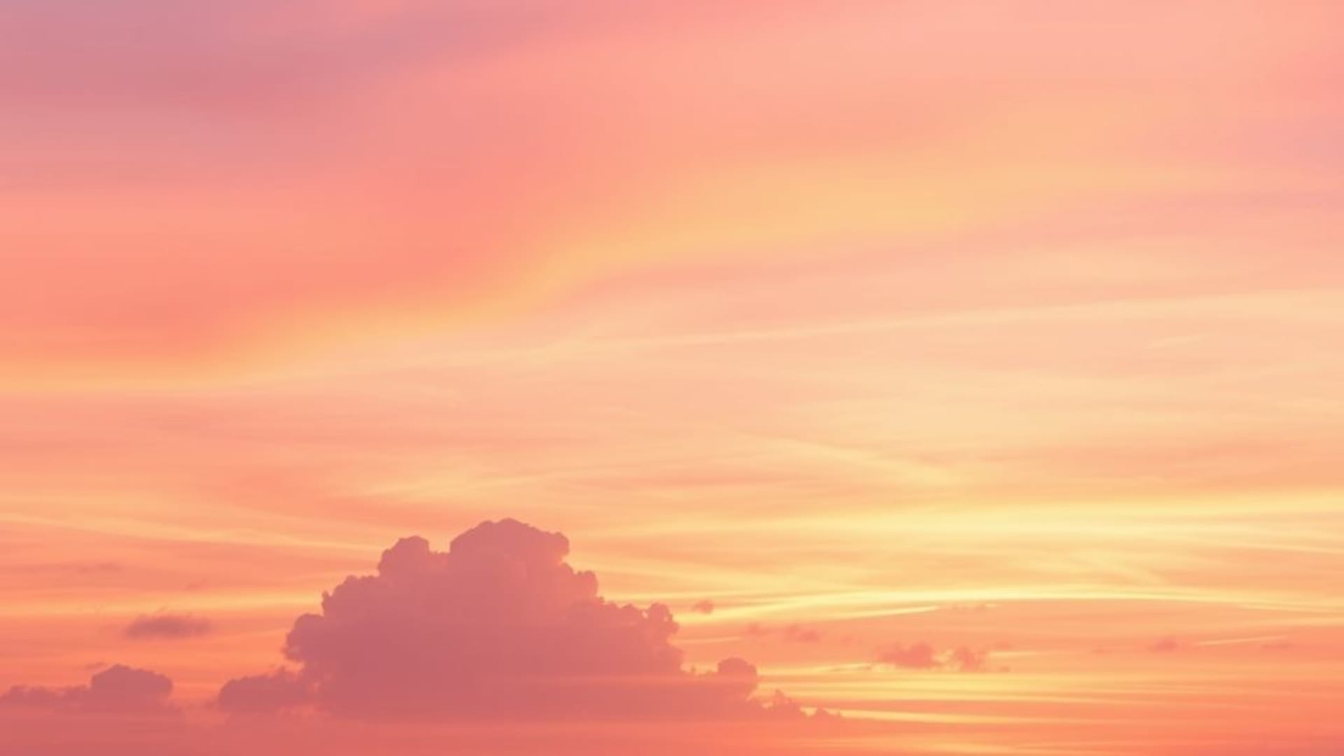Dégradé pastel de coucher de soleil à l'aquarelle nuages roses pêche lavande fond ecran abstrait doux