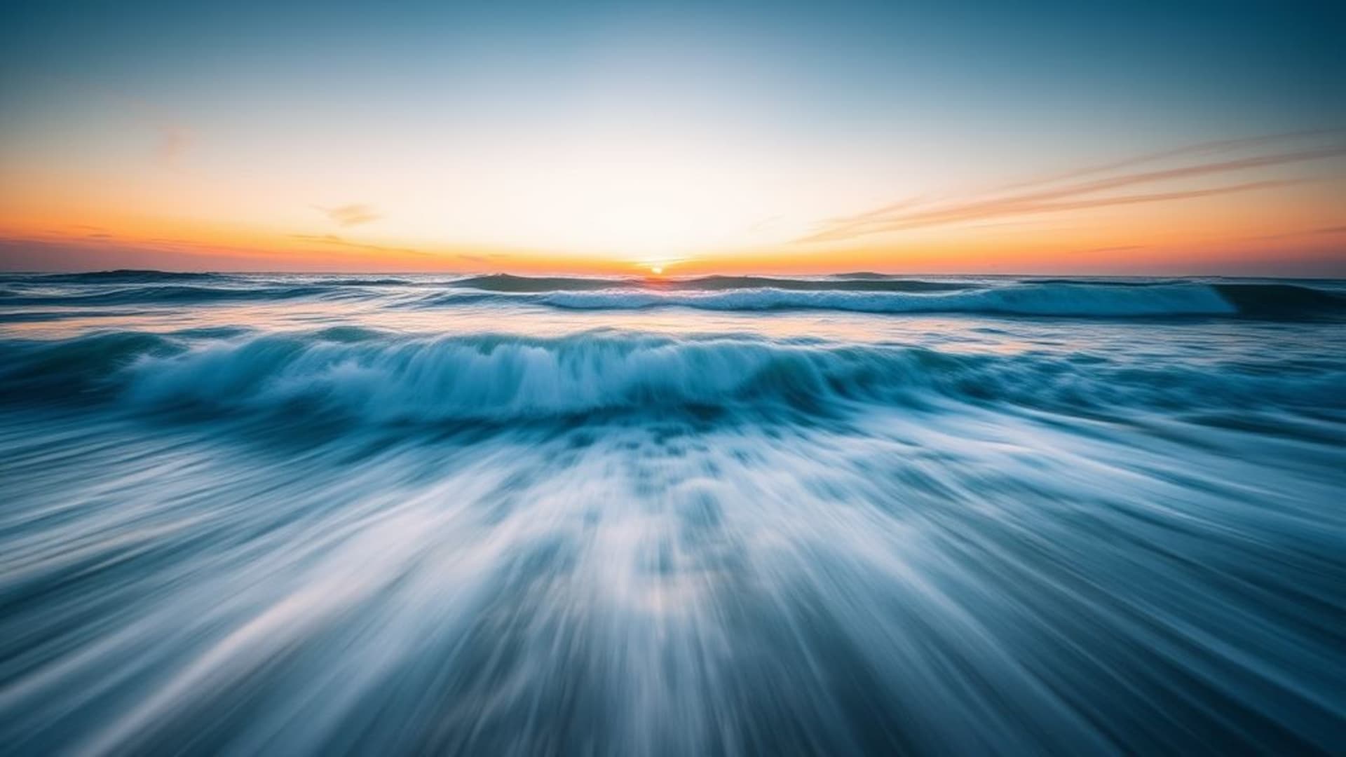 vagues de mer lever du soleil photographie longue exposition fond ecran océan bleu aqua mouvement