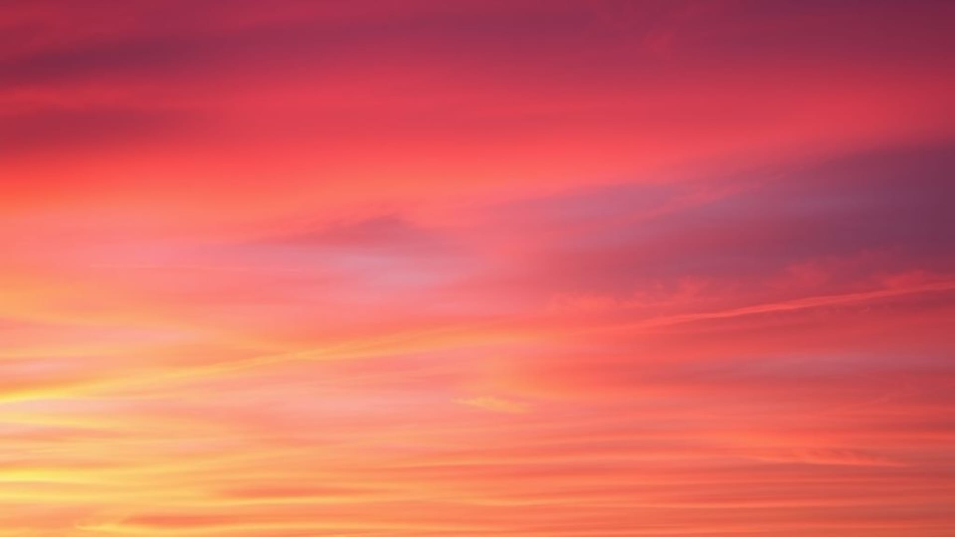 ciel de coucher de soleil en dégradé orange rose violet nuages fond abstrait lueur douce fond ecran ambiance apaisante