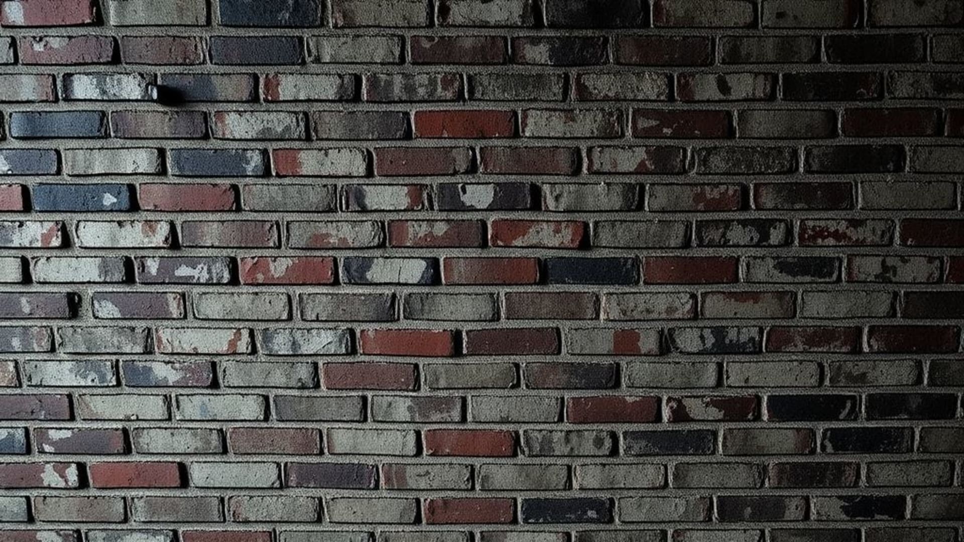 fond ecran mural en briques urbain, textures de béton, tons sombres et mystérieux