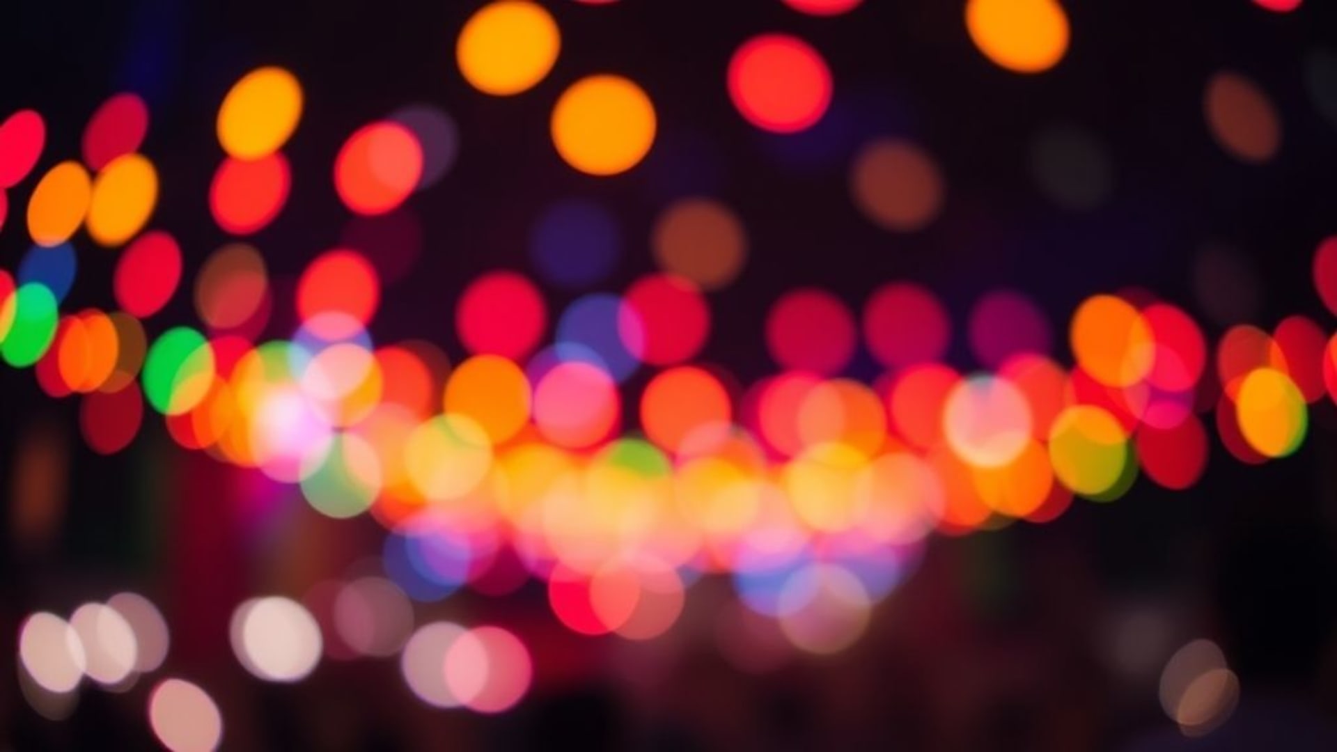 Fond d'écran de lumières de festival bokeh cercles colorés lueur chaleureuse effet rêveur