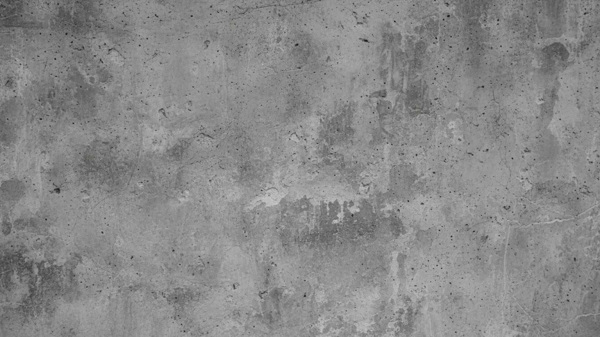 mur en béton texturé gros plan surface rugueuse monochrome urbain fond ecran industriel