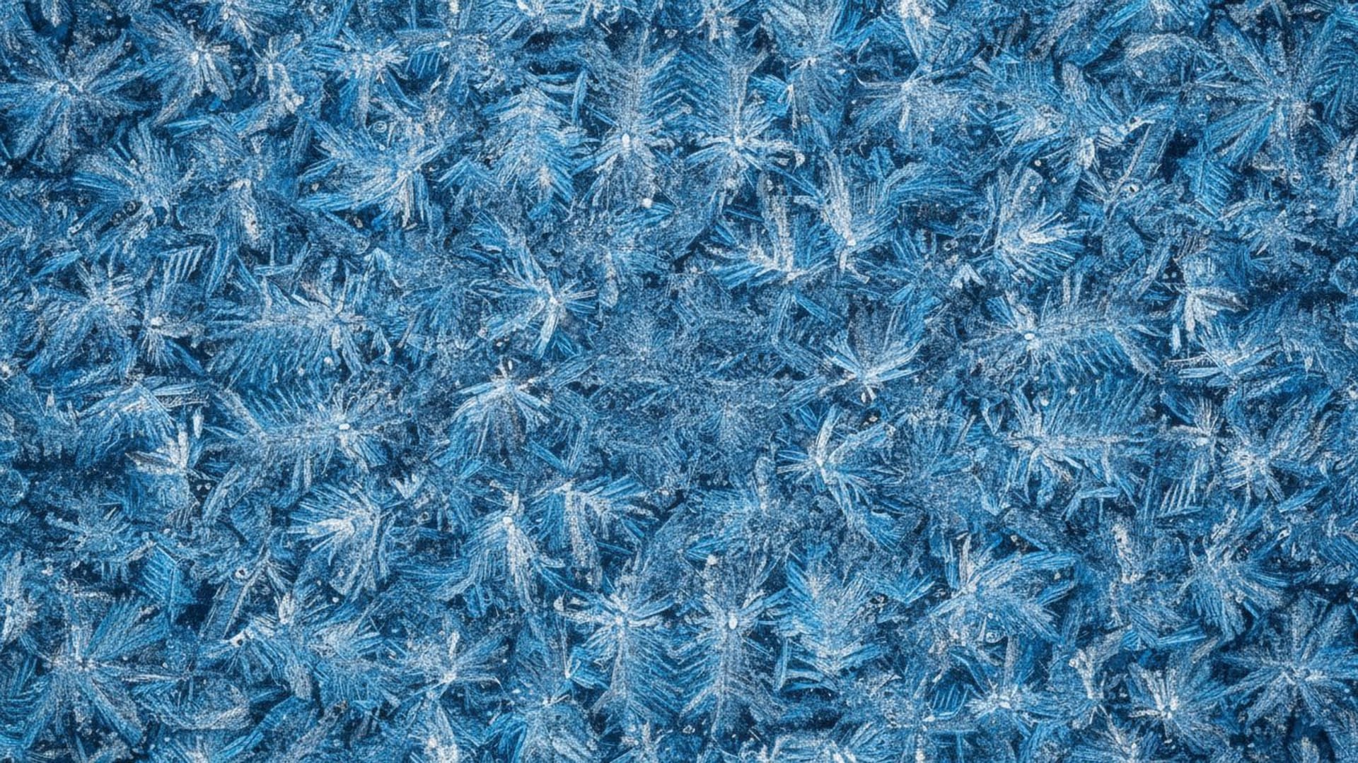 Cristaux de glace, texture macro, givre hivernal bleu, gros plan macro, motif et symétrie.