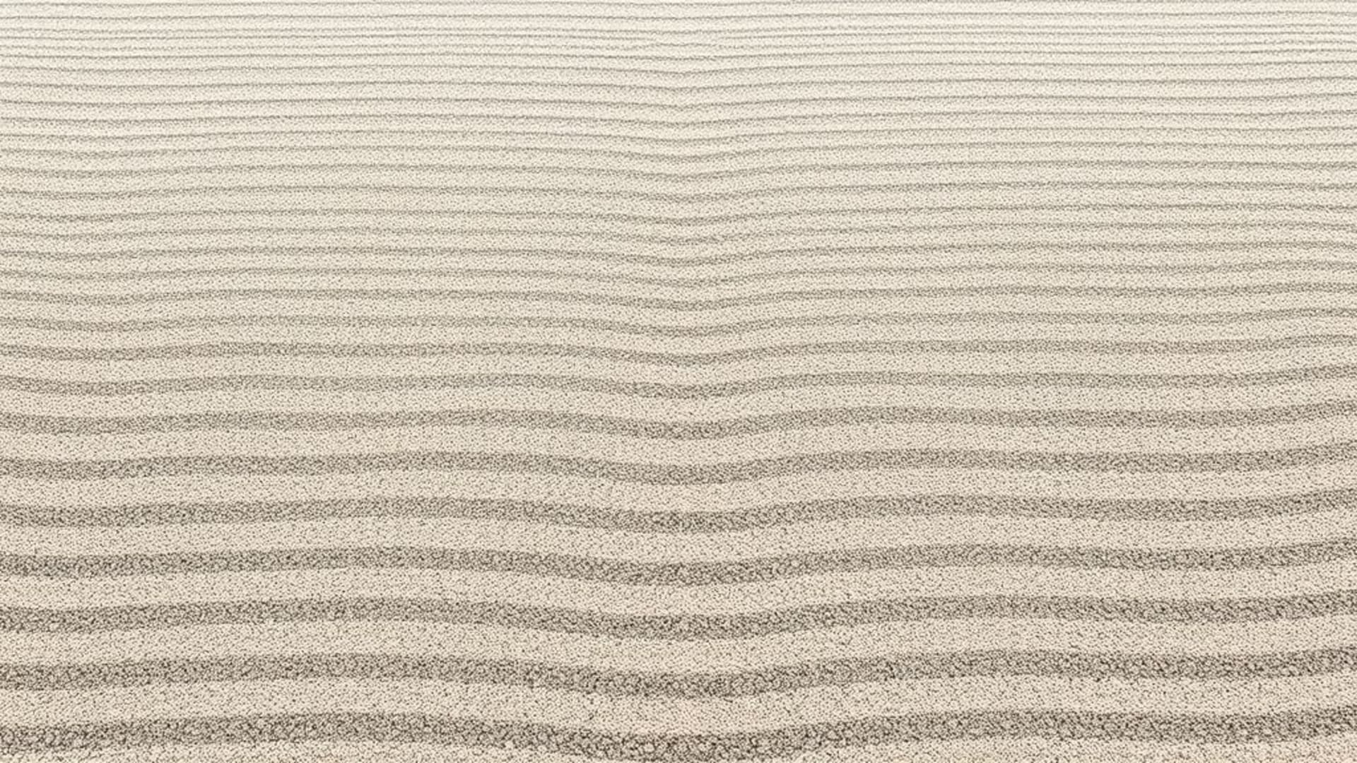 Jardin zen lignes de gravier ratissées motif de sable fond ecran espace tranquille
